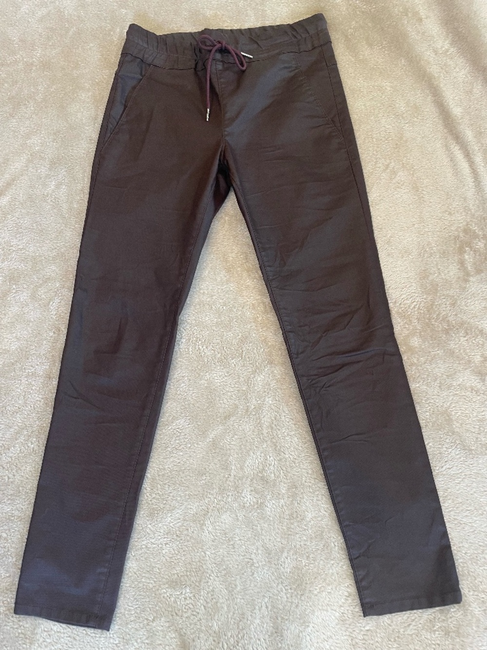 Super cool Bevy Flog cigarette pants.  Maroon in color. Size 27